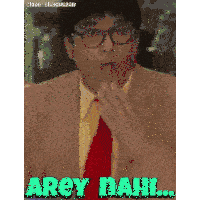a man in a suit and tie is making a funny face and saying arey nahi