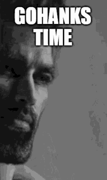 a black and white photo of a man with the words gohanks time on it