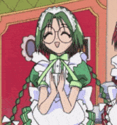 a girl with green hair and glasses wearing a maid outfit