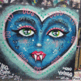 graffiti on a wall that says modo vikingo in pink