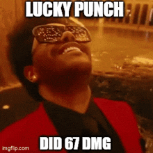 a man wearing sunglasses and a red suit says lucky punch