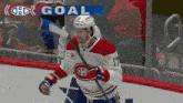 a hockey player with the number 17 on his jersey is holding a hockey stick