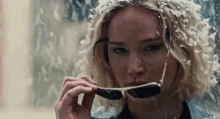 Jennifer Lawrence Puts Shades On GIF