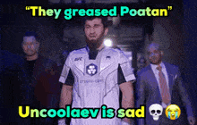 a man in a white shirt with the words " they greased poatan " and " uncoolaev is sad "