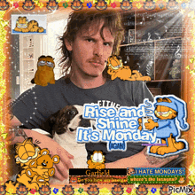 a man is holding a dog and wearing a shirt that says rise and shine it 's monday again