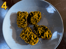 a plate with four pieces of food on it and the number four behind it