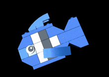 a blue lego fish with a white eye on it