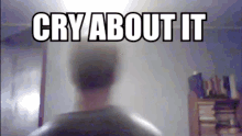 a blurred image of a person with the words cry about it written above them