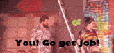 two men are standing next to each other in front of a brick wall and a sign that says `` you ! go get job ''