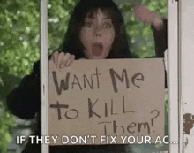 a woman is holding a sign that says `` want me to kill them ? if they don 't fix your ac . ''
