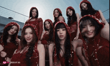a group of girls are posing for a picture with the date of 25.07.03 on the bottom