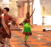 a man and a little girl are dancing in a room .