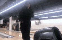 a bowling alley with a sign that says ' x ' on it
