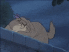 a cartoon dog is laying on a brick wall in the rain .