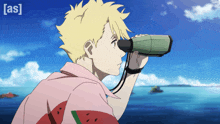 a boy in a watermelon shirt is looking through binoculars in front of the ocean