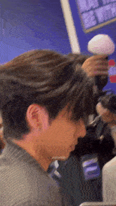 a close up of a person 's face with the name minmin on the bottom left