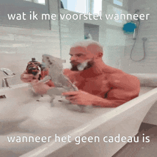 a man is taking a bath in a bathtub with a caption that says wat ik me voorstel wanneer