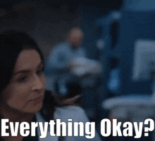 a woman in a lab coat says " everything okay " in a hospital room