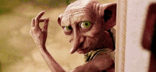 Snap Dobby GIF - Snap Dobby Harry Potter GIFs