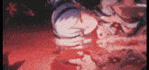 a blurry picture of a girl in a red dress in a dark room