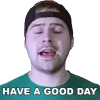 a man wearing a hat and a green shirt with the words have a good day