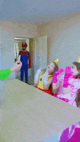 a man dressed in a mario costume with a mustache