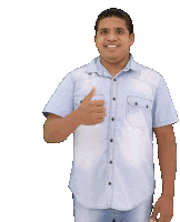 a man in a blue shirt is giving a thumbs up sign