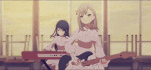 a girl in a white dress is holding a guitar