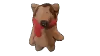 a stuffed animal with a scarf around its neck