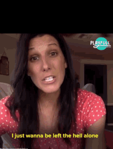 a woman says " i just wanna be left the hell alone " in front of a playfull logo