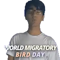 a man blowing a kiss with the words world migratory bird day below him