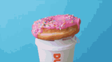 Dunkin Donut GIF - Dunkin Donut Strawberry Frosted Donut With Sprinkles GIFs