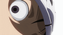 a close up of a person 's face with a white eye and a purple eye