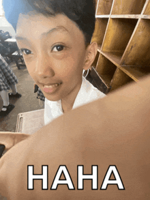 a picture of a young boy with the word haha on the bottom