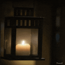 a picture of a lantern with a candle and the words good night and sweet dreams