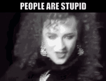 People Are Stupid Boy George GIF - People Are Stupid Boy George War Song GIFs