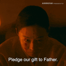 a woman with blood on her face and the words pledge our gift to father on the bottom