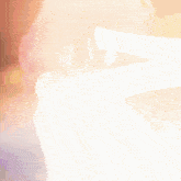 a girl with pink hair is standing in front of a white cloth