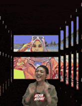 a picture of a woman with the words asyik asyik