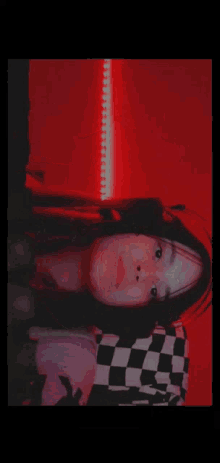 a blurred image of a woman 's face with hearts on it