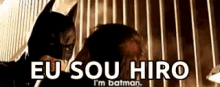 a picture of batman with the words eu sou hiro i 'm batman .