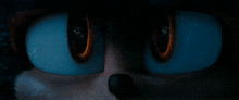 a close up of the eyes of a cartoon character