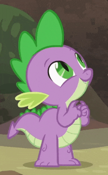 spike from my little pony is a purple dragon with a green tail