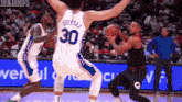a basketball player wearing a jersey with the number 30 on it