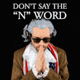 a man wearing a wig and headphones is praying with the words " don 't say the n word " above him