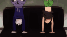 two cartoon characters are doing handstands on a couch