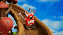 a toy robot is going down a slide with the number 1 on it