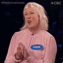 a woman with a name tag that says karen on it