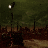 a dark landscape with a few trees in the foreground and a tower in the background