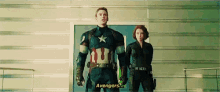 captain america and black widow are standing next to each other and talking about the avengers